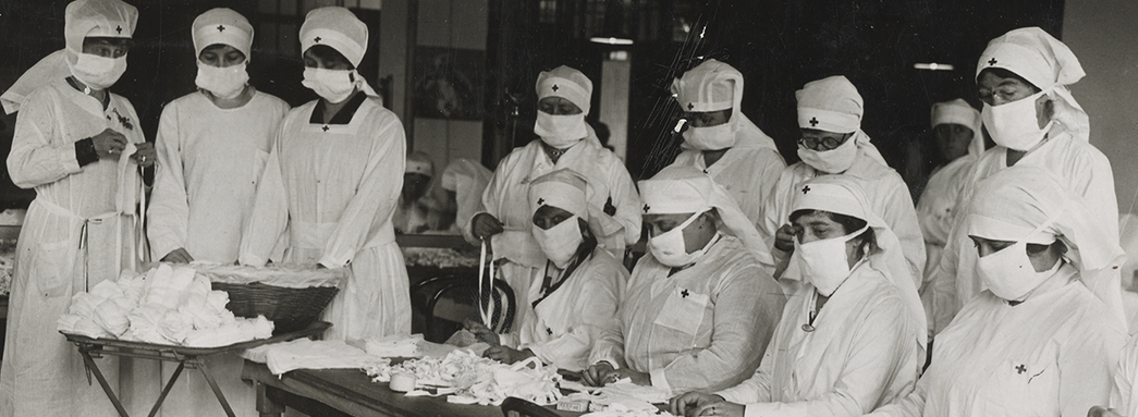 Red Cross workers make masks